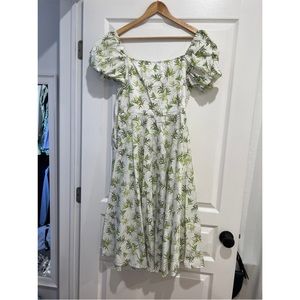 Caroline Constas size Medium midi dress with leaf print.